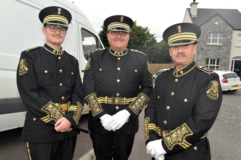 Members of Kilcluney Volunteers Flute Band pictured before taking part in the Mavemacullen Accordion Band 70th anniversary parade in Markethill. Included are from left, Joshua Adamson, Roger Hutchinson and Brian Adamson. PT32-227.