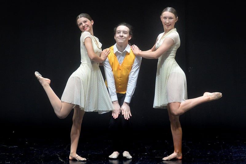 Dancing to the famous song from 'Singing In The Rain' in the Modern Trio competition at Portadown Dance Festival are Eve Dillon, Adam Donnelly and Faye Pearson. PT17-259.