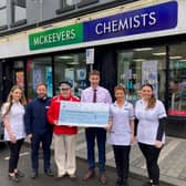 Pictured, from left, Sheila Meagher from McKeevers Chemists with James McCaffrey  (Southern Area Hospice), Newry legend John Dalzell, Paul McKeever (Managing Director, McKeevers Chemists) along with Ruth England and Aoife McAteer also from McKeevers Chemists.
