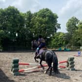 Pictured: The horse-riding session in progress. The Pony Camp’ for children who have been adopted gave children an opportunity to socialise with other children who have also experienced the adoption process. Photo contributed via South Eastern HSC Trust