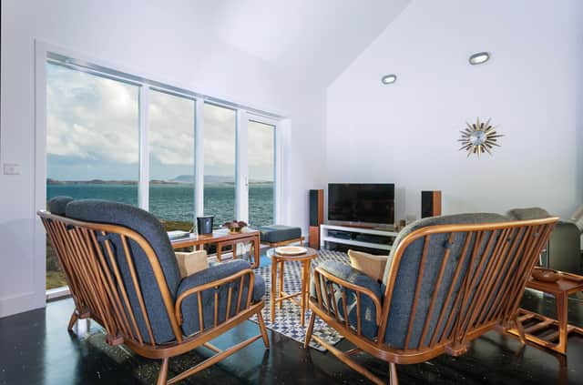 Image sitting back in your luxurious designer living room and enjoying these views at the Sound of Harris.