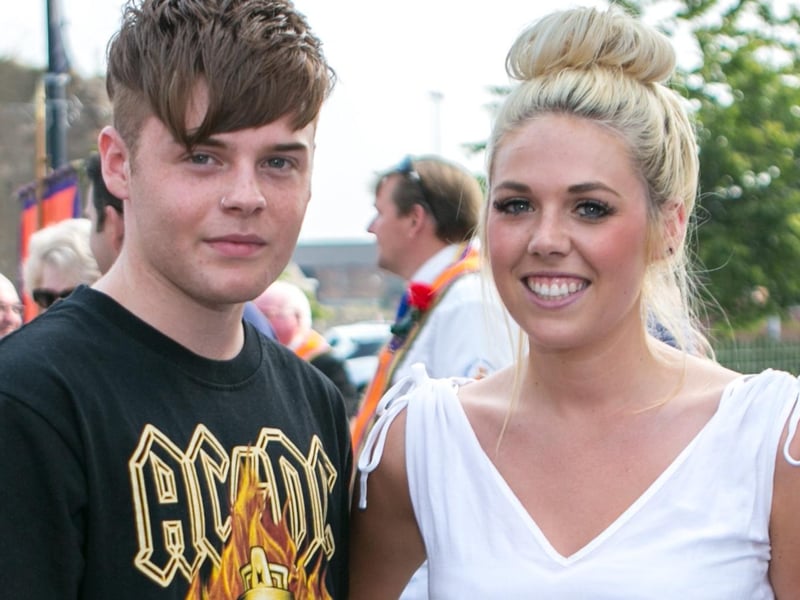 Siblings Stephen and Emma Martin out watching the parades. INCT 29-406-RM