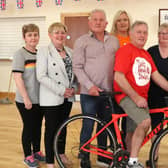 Martin McLean, centre, who presented a cheque for £1,290 to Elizabeth White, Ambassador, NI Chest Heart and Stroke and Dian McFadden, Ballycastle Support Group and a cheque for £1,290 to Heather Gott, Fundraising Manager, MS. Included are Martin's wife Ann and family members Sharon McKillop and Stephen McKillop.