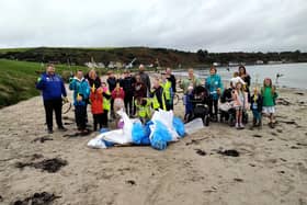 The group of Beach Clean volunteers at Browns Bay.  Photo: Elena Aceves-Cully