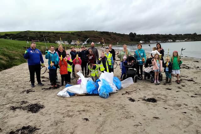 The group of Beach Clean volunteers at Browns Bay.  Photo: Elena Aceves-Cully