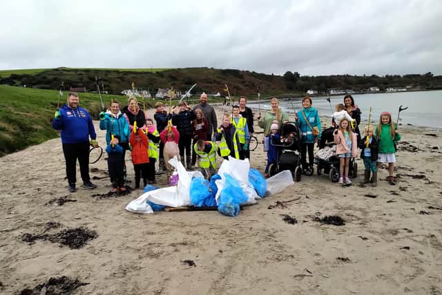 The group of Beach Clean volunteers at Browns Bay. Photo: Elena Aceves-Cully