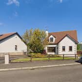 The detached house benefits from a double storey extension.