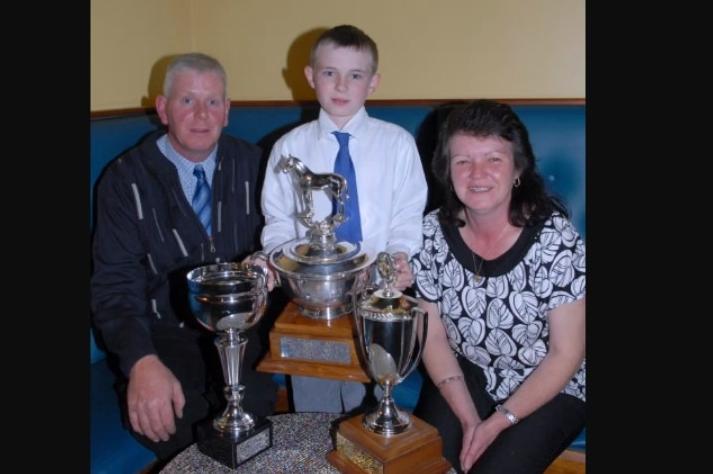 John Weir, John Weir Jnr and Eileen Weir pictured at the 2007 Mounthill Fair prize giving in the Larne Masonic Centre with the William Henry Irvine Memorial Cup for Road Cart; the Folklore Society Trophy for Farm Cart and the John Clifford Memorial for Gig Class.