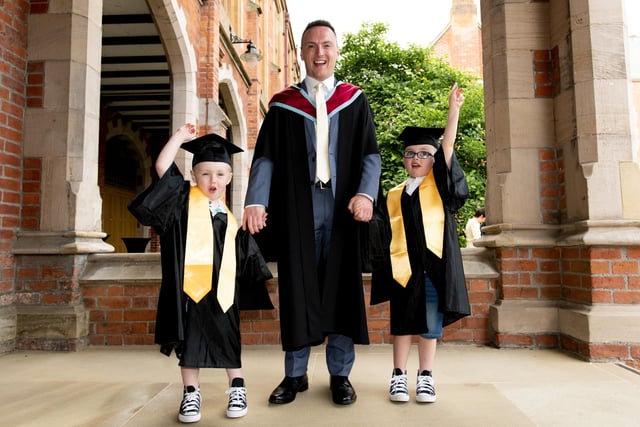 Gerard Darragh celebrates his graduation with sons Odhran and John