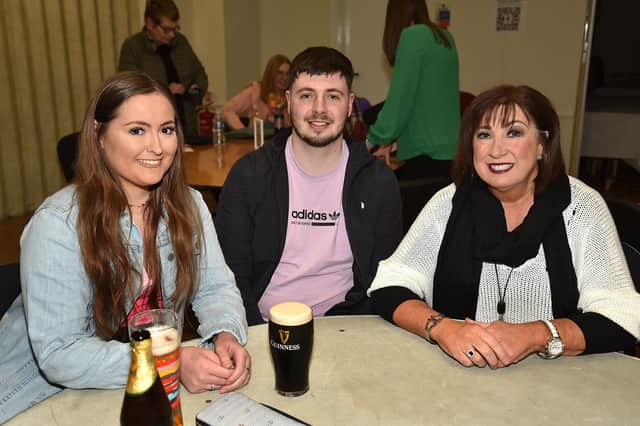 Enjoying the Parents and Friends of Portadown College fundraising quiz are from left, Anna Winter, Mark Bulloch and Alison Jameson. PT09-225.