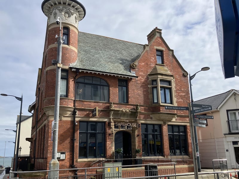Formerly the Northern Bank on Portrush's Main Street, this gorgeous building is now a bar and restaurant called, appropriately enough, The Safehouse. This striking building was completed in February 1898 and was the work of the architect Vincent Craig, of Belfast. It was highly praised at the time for “the artistic beauty of its design…singularly pleasing by the tasteful intermingling of Dungiven stone dressings with red brickwork”. I opened my very first savings account in this bank back in the 70s. The bank closed in 2012 but the building is now a listed protected premises. Paying homage to its former occupation, when you take a wander into The Safe House and you can enjoy a snack or a cocktail in the old safe.