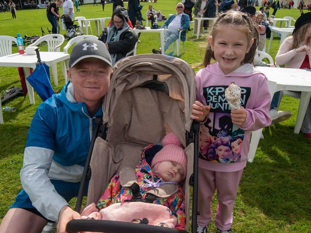 Enjoying the fun and sun at the Culture In The Park event aremembers of the McConnell family including, dad Padraig, Grace (1) and Enya (7).
