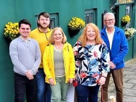 Naomi Long in Hillsborough with Kurtis Dickson, Councillor Aaron McIntyre, Gretta Thompson and Alderman Owen Gawith