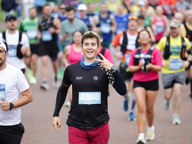 Smiling for the camera while taking part in the Phoenix Energy Belfast City Marathon.