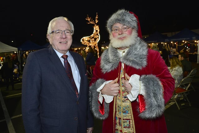 Alderman Allan Ewart MBE, Chair of the Lisburn & Castlereagh City Council Development Committee and Santa at the Christmas Market in Dundonald