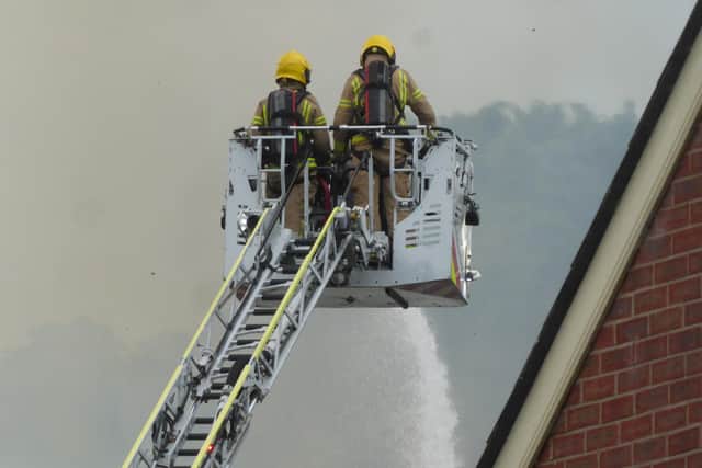 Firefighters battle the blaze at the former Hilden Mill. Pic credit: Paul Burns