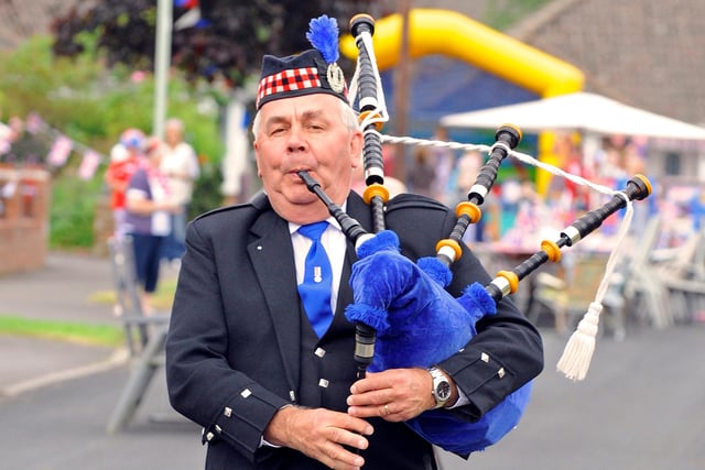 Her Majesty The Queen's Diamond Jubilee Street party in Fairmead Walk Cowplain was launched by piper Phil Garrod (64) 
Picture: Malcolm Wells (121947-604)