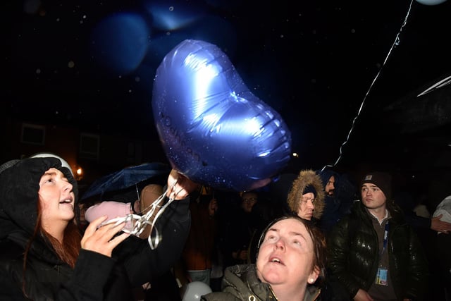 Balloons were released at the vigil for Odhran Kelly. LM50-240.