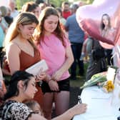 Signing a book of condolence in Ballymena on Wednesday evening.