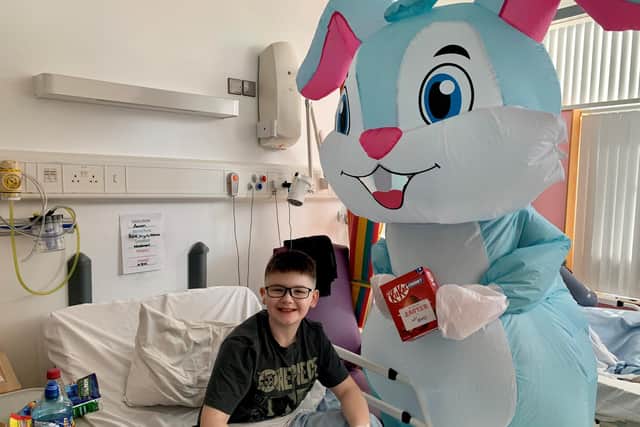12-year-old Aaron Gallagher with the Easter bunny. Pic credit: SEHSCT