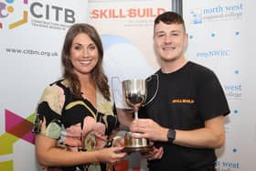 Pictured at the CITB NI SkillBuild NI Finals 2023 was Conor Dallas from Northern Regional College’s Ballymoney campus receiving the Overall Apprentice of the Year award from Sarah Travers, host and MC at the competition.