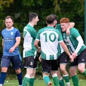 Lisdrum's Paul Cunningham, pictured being congratulated by his teammates after scoring a goal during the league, also netted on Saturday as his side progressed in the AOH Cup beating Millburn Utd 3-2.