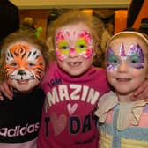 Painted faces...Showing off their fantastic faces at the St Patrick's fun day are from left, Ella Breen (5), Caila McCann (6) and Eimi Byrne Hogan. PT11-235.