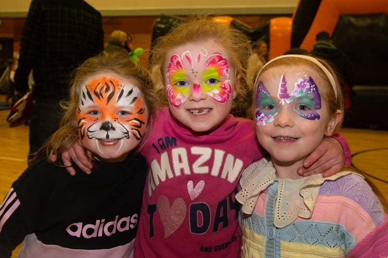 Painted faces...Showing off their fantastic faces at the St Patrick's fun day are from left, Ella Breen (5), Caila McCann (6) and Eimi Byrne Hogan. PT11-235.