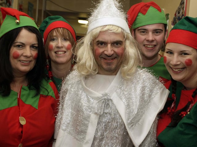 Principal of Lislagan PS Wesley Edgar, who really looked the part of Mrs Santa Claus at the school in 2008 -  as did his elf looking staff.
