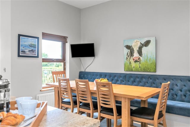This extensive, modern cottage is on the market now.