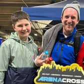 Ballyclare’s Martin Barr who rides in the Pro class for Apico Husqvarna at the2023  UK Arenacross is pictured with Larne brothers William (left) and Jax Knox who races in the AX W5 electric class