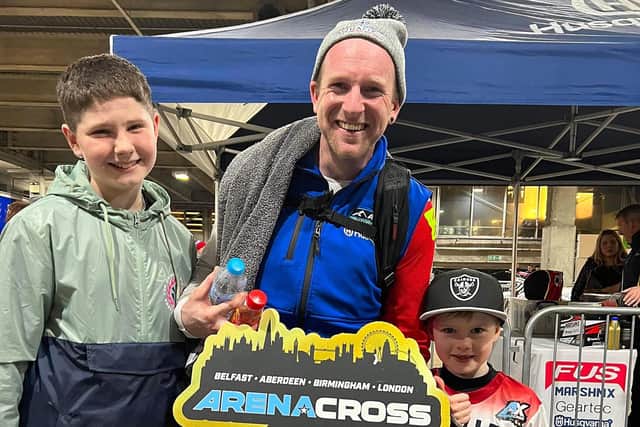 Ballyclare’s Martin Barr who rides in the Pro class for Apico Husqvarna at the2023  UK Arenacross is pictured with Larne brothers William (left) and Jax Knox who races in the AX W5 electric class