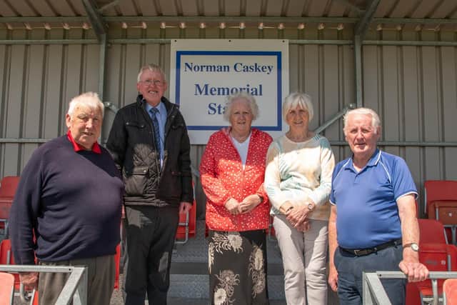 The opening of a new stand in honor of the Desertmartin FC's former chairman the late Norman Caskey took place on July 8. Pictured at the club's ground are members of Norman's family. Credit: DFC