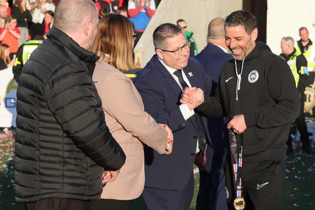 Larne manager Tiernan Lynch enjoys a laugh after receiving his Sports Direct Premiership medal following the game at Inver Park.