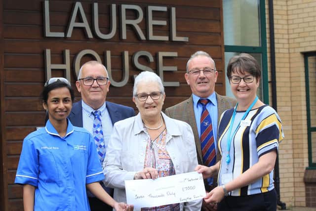 The Laurel House chemotherapy unit at Antrim Area Hospital has received a cheque for £7,000. Staff nurse Akhila Abraham, and Moyra Mills, Laurel House Cancer Services, received the cheque from Alex Robinson, Ivan Forsythe and Marian Forsythe. Credit: Julie Hazelton
