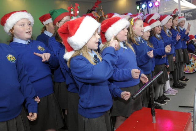 Entertaining the crowds are St Anthony's PS Choir at Brownlow Christmas Lights Switch On event 23rd November 2022. ©Edward Byrne Photography