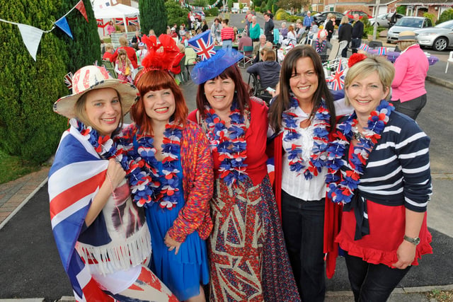 Her Majesty The Queen's Diamond Jubilee Street party in Three Acres Denmead
(left to right) Sarah Birch (38), Debs Wallace (40), Karen Ward (40),  Jacqui Graham (38) and Louise Oliver (41) 
Picture: Malcolm Wells (121947-6602)