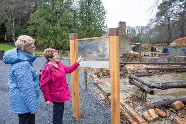 Elizabeth Ellis and Sandra Bishop enjoying their visit to The Lost Garden Trail. Visitor interpretation located throughout the trail reveals the physical and historical elements of the trail and garden.