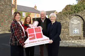 Pictured (l-r) Kelly Neill, Assistant Hotel Manager, The Bushmills Inn; and Charlene Dickey, a member of the Northern Ireland Children to Lapland and Days to Remember Trust Management Board; Colin Barkley, Chair, NICLT; and Nikki Picken, Sales & Marketing Manager, The Bushmills Inn.