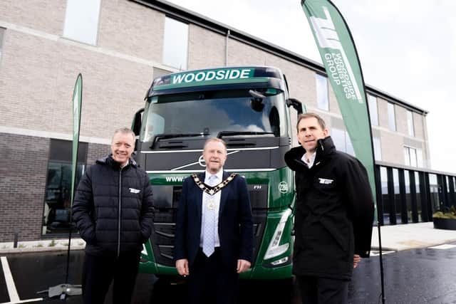 Ald Stephen Ross with Woodsides Logistics Groups directors Robert and Simon Woodside.