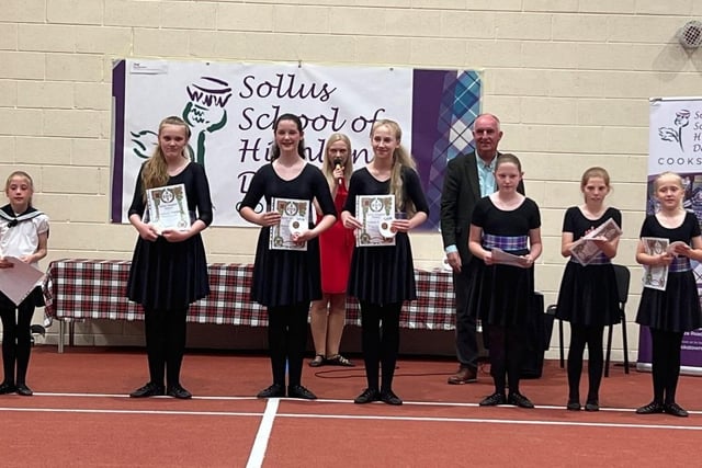 Young Highland dancers proudly show off their certificates. Credit: Jillian Lennox
