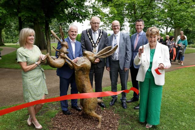 Pictured at the bronze sculpture of the two Nutbrown Hares from Guess How Much I Love You are: (l-r) Sarah McBratney; Councillor Thomas Beckett, Communities & Wellbeing Chairman; Mayor Councillor Andrew Gowan; Councillor Tim Mitchell, Vice-Chair of Regeneration and Growth Committee; David Burns, Chief Executive Lisburn & Castlereagh City Council and Maralyn McBratney. Pic credit: Lisburn & Castlereagh City Council