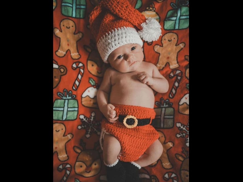 A Santa outfit for this little one.