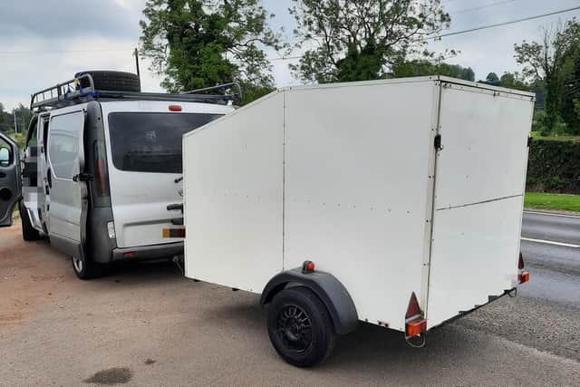 Police stopped the driver of this van for driving whilst using a hand-held mobile phone. Picture: PSNI