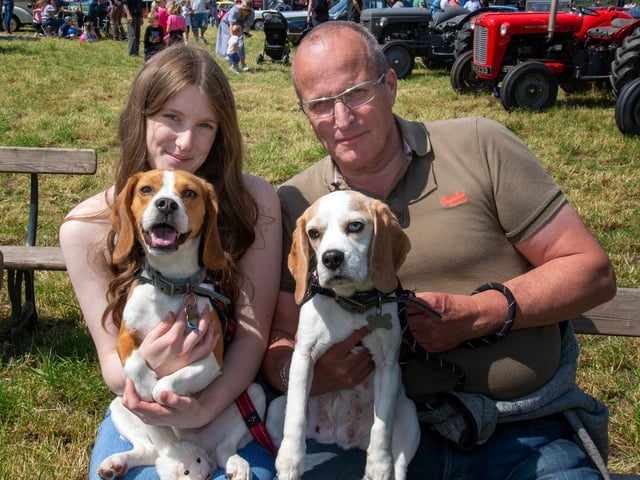 Jasmine and John De Gier pictured with their Beagle dogs, Toby and Lucy at the Drumcree Parish Garden Fete dog show. PT23-232.