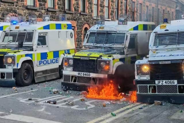 Police responding to disorder in Ballymena last month. Photo: Pacemaker
