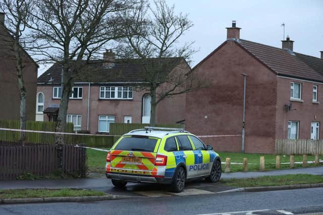 Police have cordoned off part of a housing estate in Limavady and forensic markers have been placed near the cordon at Woodland Walk. Picture: Pacemaker