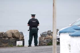 Police at the scene in Cultra, Co Down after a woman’s body was found on a beach. Picture: Jonathan Porter / Press Eye