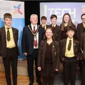 Mayor of Causeway Coast and Glens, Councillor Steven Callaghan with students from Cross and Passion College.