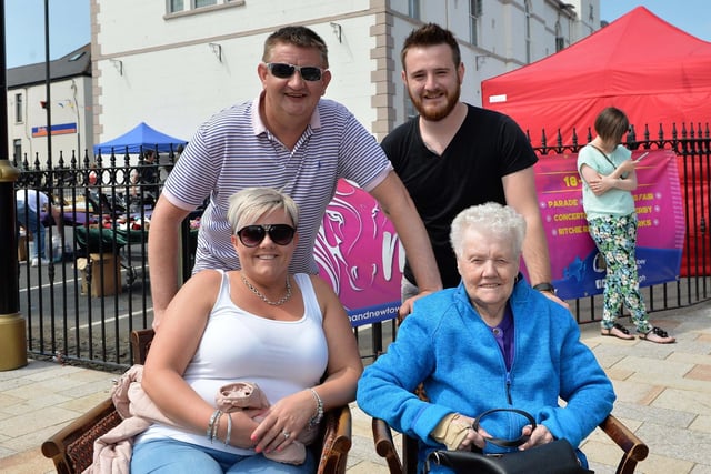 Johnny and Tracey Bogle (left) with Gary Laughlin and Susan Cowan enjoying the sunshine at the Ballyclare May Fair Parade in 2018. INNT 22-006-PSB